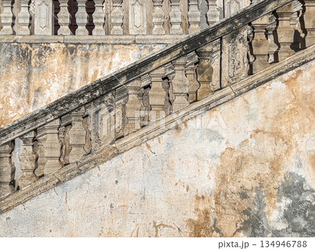 Weathered old balustrade stone staircase architectural detail 134946788