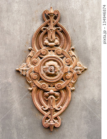 Ornate antique wrought iron floral decorative ornament Ornate antique wrought iron floral decorative ornament 134946874