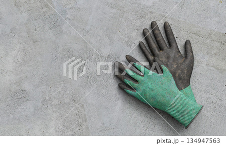 Industrial Cotton Work Gloves with Rubber Coating. 3D Rendering. Industrial Cotton Work Gloves with Rubber Coating. 3D Rendering. 134947563