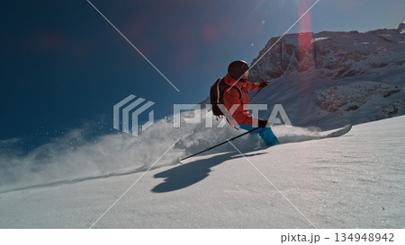 Skier riding in the scenic Dolomites mountains in fresh po . Super slow motion at 1000 fps. Skier riding in the scenic Dolomites mountains in fresh po . Super slow motion at 1000 fps. 134948942