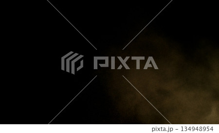 Freeze Motion Shot of Flying Sand Dust , Isolated on Black Background Freeze Motion Shot of Flying Sand Dust , Isolated on Black Background 134948954