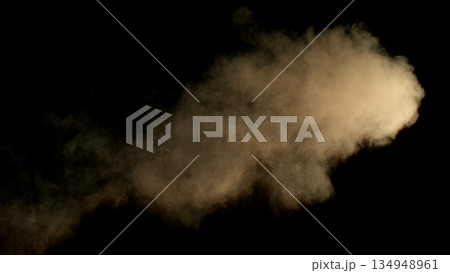 Freeze Motion Shot of Flying Sand Dust , Isolated on Black Background Freeze Motion Shot of Flying Sand Dust , Isolated on Black Background 134948961