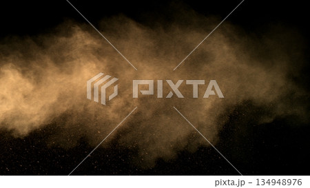 Freeze Motion Shot of Flying Sand Dust , Isolated on Black Background 134948976