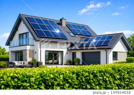 Modern Family House with Solar Panels and Green Energy Concept 134954038