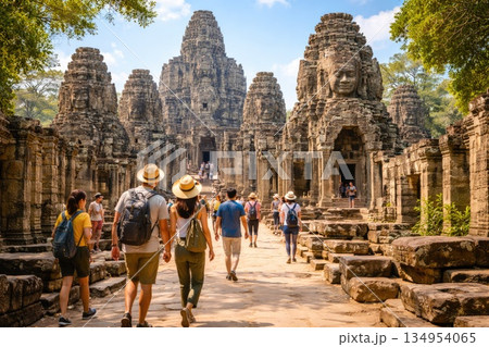 Tourists Walking Through Ancient Bayon Temple in Cambodia 134954065