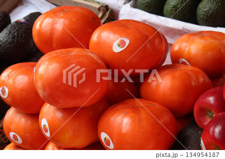 ripe Persimmon stock on shop for sell ripe Persimmon stock on shop for sell 134954187