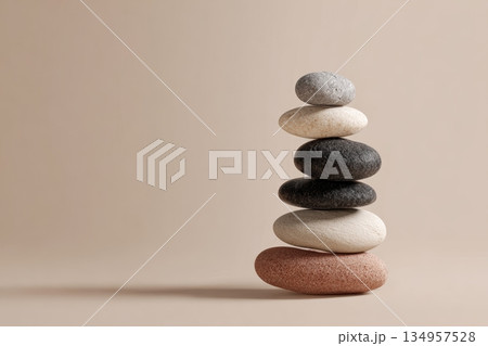 Stacked stones create a serene balance display 134957528