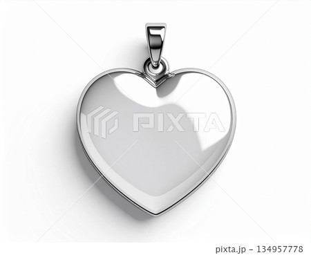 Metallic keyring. Metal heart-shaped keychain on white background. 134957778