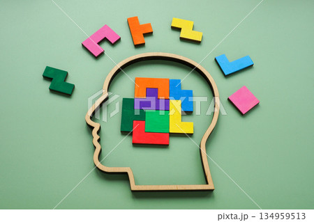 Human head with colorful puzzle pieces. Creative thinking. Human head with colorful puzzle pieces. Creative thinking. 134959513