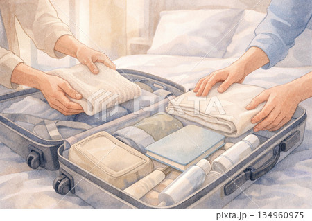 朝の荷造りを一緒に進める日本人カップルの手元 134960975