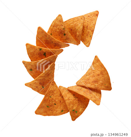Crispy, golden yellow tortilla chips isolated on transparent background. Perfect for mexican food, nachos, dips, and snack packaging Crispy, golden yellow tortilla chips isolated on transparent background. Perfect for mexican food, nachos, dips, and snack packaging 134961249