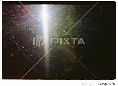 Dusty abstract surface with bright streak on analog film 134961570