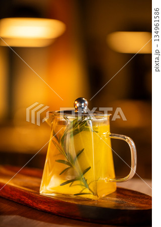 Glass teapot with herbal tea infusion 134961586