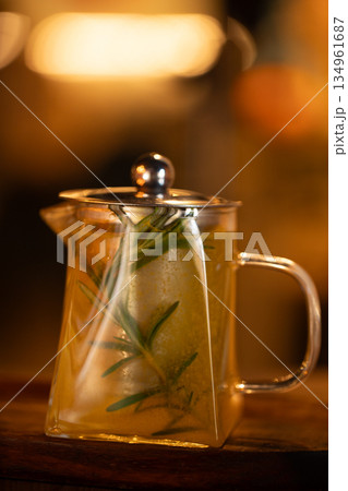 Glass teapot with herbal infusion Glass teapot with herbal infusion 134961687