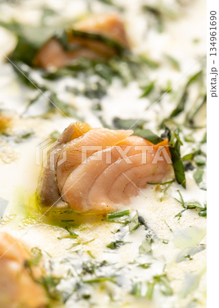Closeup of fresh salmon sashimi slice Closeup of fresh salmon sashimi slice 134961690