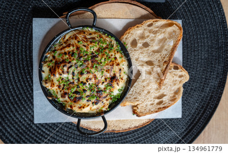 Baked Cheese Dip with Toasted Bread 134961779