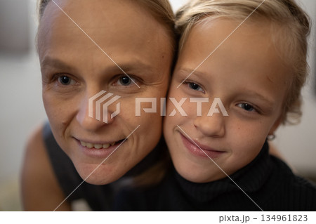 Mother and child smiling closeup 134961823