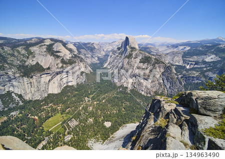 Half Dome and Granite Cliffs Overlooking Yosemite Valley from Glacier Point Half Dome and Granite Cliffs Overlooking Yosemite Valley from Glacier Point 134963490