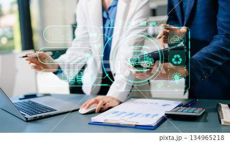 ESG concept of environmental, Green ethical business preserving resources, reducing CO2, Business person team working on laptop virtual smartphone ESG concept of environmental, Green ethical business preserving resources, reducing CO2, Business person team working on laptop virtual smartphone 134965218