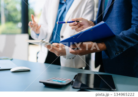 Business team meeting. professional investor working new start up project. Finance task. with smart phone and laptop and digital tablet computer 134965222