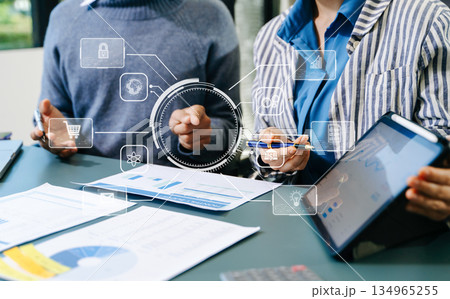 Working team meeting concept, business using laptop and smart phone and digital tablet computer with digital marketing media  in virtual icon network diagram office 134965255