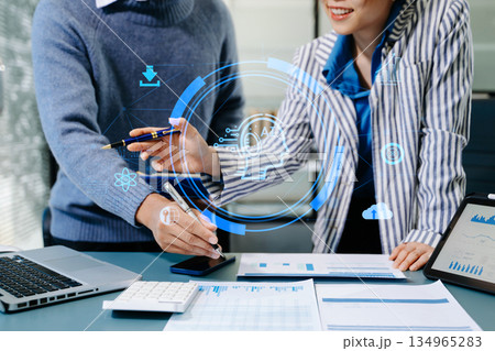 Team using chatbot in computer and tablet smart intelligence Ai.Chat with AI Artificial Intelligence, developed by OpenAI Team using chatbot in computer and tablet smart intelligence Ai.Chat with AI Artificial Intelligence, developed by OpenAI 134965283