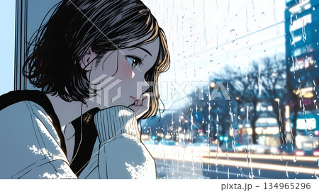 思案・反省・諦め? 窓から流れ落ちる雨粒を見つめる若い女性
