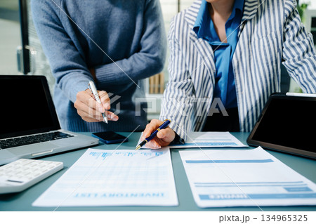 Business team meeting present.professional investor working with Finance managers task. with digital tablet,smartphone and laptop 134965325