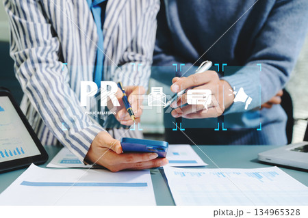 PR, Public relations concept. hands using laptop and tablet with public relations icon for communication advertising marketing strategy. with Ads and sales PR, Public relations concept. hands using laptop and tablet with public relations icon for communication advertising marketing strategy. with Ads and sales 134965328