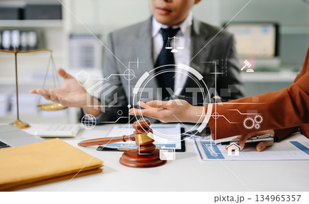 Digital law and justice concept with holographic icons, gavel, and scales in modern office, symbolizing innovation, legal technology Digital law and justice concept with holographic icons, gavel, and scales in modern office, symbolizing innovation, legal technology 134965357