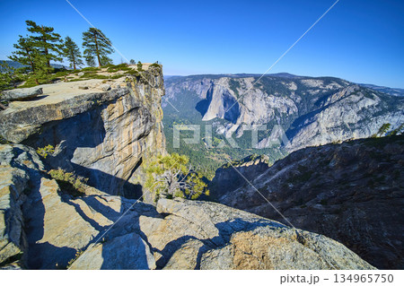 Taft Point Granite Cliffs with El Capitan and Pine Trees in Yosemite National Park 134965750