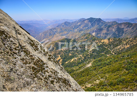 Moro Rock Granite Face Overlooking Forested Mountains in Sequoia National Park Moro Rock Granite Face Overlooking Forested Mountains in Sequoia National Park 134965785