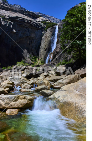 Panorama of Yosemite Lower Falls Trail with Waterfall Stream and Granite Boulders Panorama of Yosemite Lower Falls Trail with Waterfall Stream and Granite Boulders 134965942