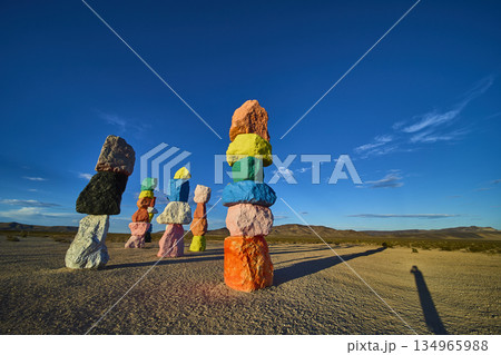 Seven Magic Mountains Colorful Rock Stack Installation in Nevada Desert under Blue Sky 134965988