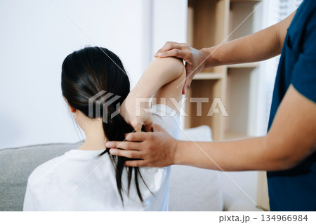 Healthcare professional providing back physiotherapy and pain relief treatment, showing patient recovery, rehabilitation, and physical therapy care support. Healthcare professional providing back physiotherapy and pain relief treatment, showing patient recovery, rehabilitation, and physical therapy care support. 134966984