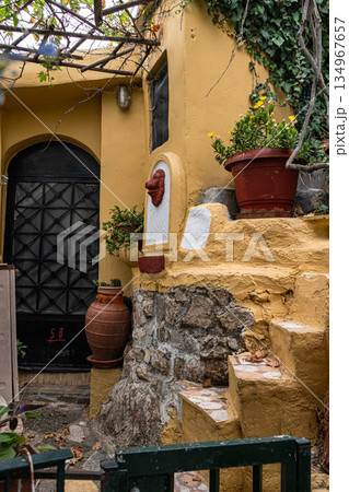 Narrow streets of Anafiotika area in ancient Athens Narrow streets of Anafiotika area in ancient Athens 134967657