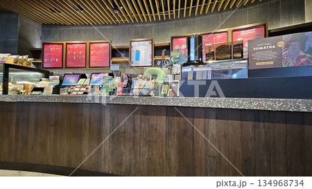 this is starbucks cafe display with food and drink 134968734