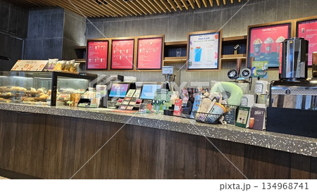this is starbucks cafe display with food and drink 134968741