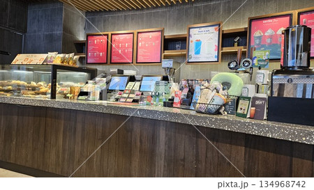 this is starbucks cafe display with food and drink 134968742