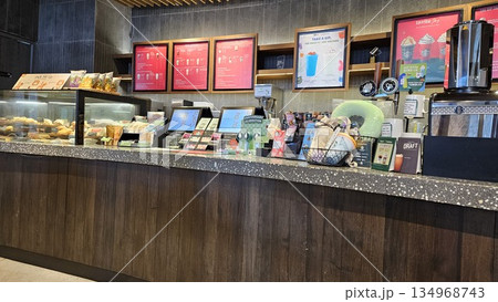 this is starbucks cafe display with food and drink 134968743