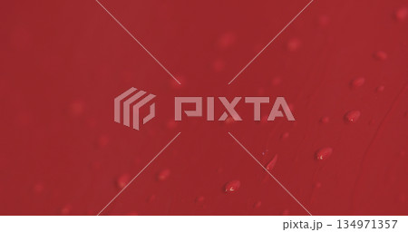 Closeup focus red car wash degreasing paint soak Closeup focus red car wash degreasing paint soak 134971357