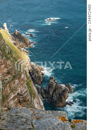 Scenic view of the rugged coastline and deep blue ocean at Cape of Good Hope 134972400