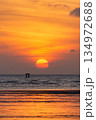 Sunrise iat Saphanhin public beach, Phuket, Thailand. 134972688