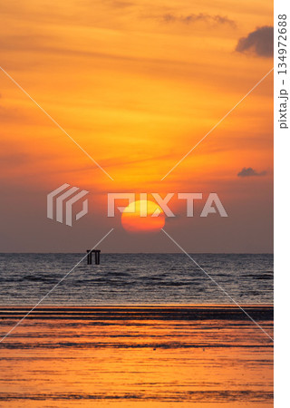 Sunrise iat Saphanhin public beach, Phuket, Thailand. Sunrise iat Saphanhin public beach, Phuket, Thailand. 134972688