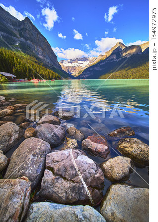 Lake Louise Turquoise Water Rocky Shore and Glacier Mountain Peaks Summer Day Lake Louise Turquoise Water Rocky Shore and Glacier Mountain Peaks Summer Day 134972975