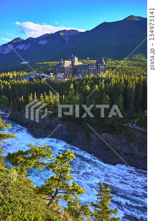 Banff Springs Hotel Castle Forest and River with Mountain Backdrop in Canada 134973141