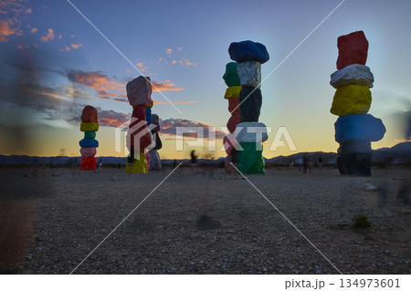 Seven Magic Mountains Vibrant Rock Stacks at Sunset in Nevada Desert 134973601