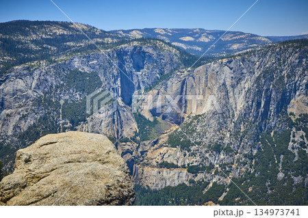 Glacier Point Granite Cliffs Waterfall and Forested Mountains Yosemite National Park 134973741