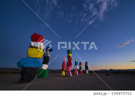 Seven Magic Mountains Colorful Rock Cairns at Sunset in Nevada Desert Landscape Seven Magic Mountains Colorful Rock Cairns at Sunset in Nevada Desert Landscape 134973753