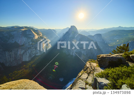 Half Dome Sunrise View from Glacier Point with Sunbeam Over Yosemite Valley Half Dome Sunrise View from Glacier Point with Sunbeam Over Yosemite Valley 134973898